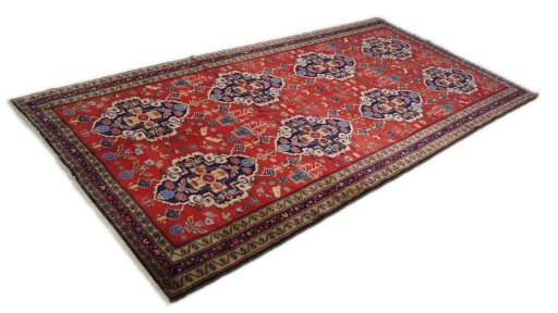 Corner detail of 2000s Meshkin rug showing border pattern and Wool pile