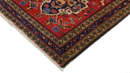 Backside of handmade 2000s Meshkin rug showing knot structure and weave density