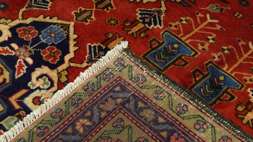 Close-up detail of 2000s Meshkin rug from Iran / Persia showing Wool weave