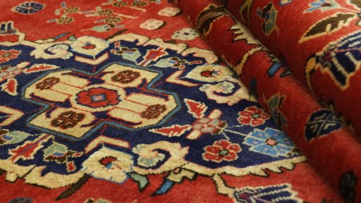 Full view of 2000s Meshkin rug from Iran / Persia, 310 × 155 cm in Red tones