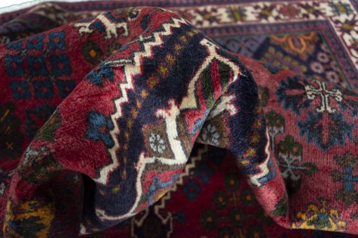 Close-up detail of 2000s Meymeh rug from Iran / Persia showing Wool weave