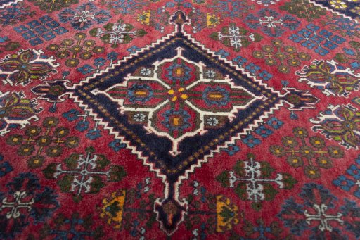 Central medallion detail of 2000s Meymeh rug from Iran / Persia