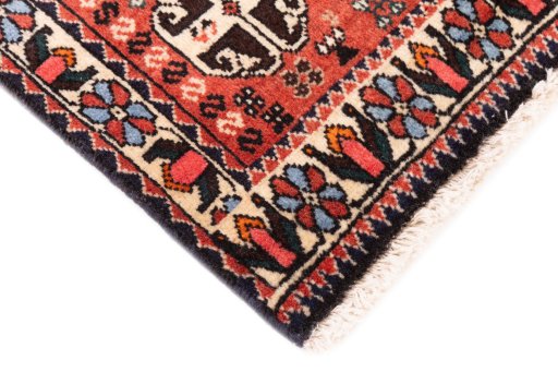 Backside of handmade 1975s Meymeh rug showing knot structure and weave density