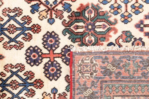 Close-up detail of 1999s Meymeh rug from Iran / Persia showing Wool weave