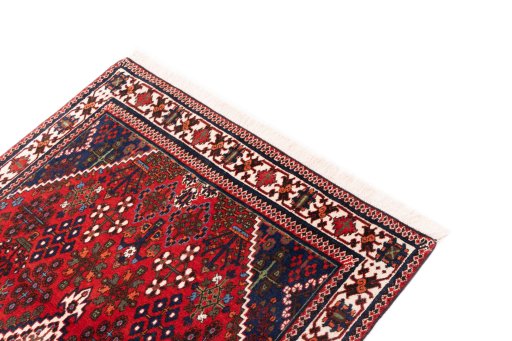 Surface texture of 1977s Meymeh rug with natural Wool and intricate pattern