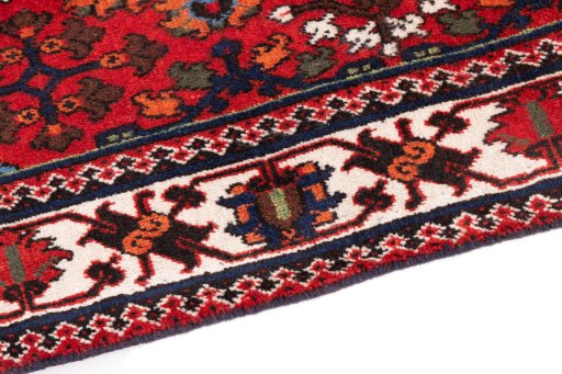 Backside of handmade 1977s Meymeh rug showing knot structure and weave density