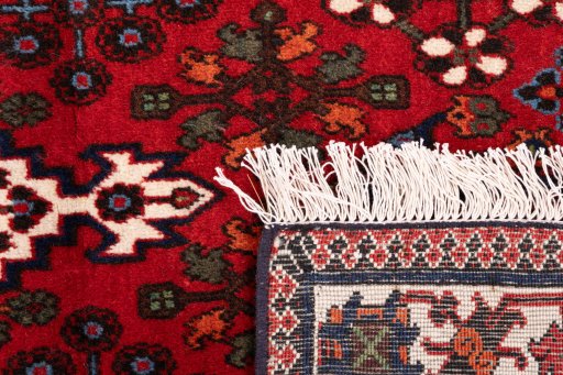 Close-up detail of 1977s Meymeh rug from Iran / Persia showing Wool weave