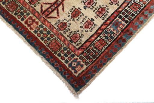 Backside of handmade 1920s Sarab rug showing knot structure and weave density