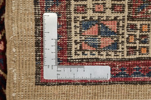 Close-up detail of 1920s Sarab rug from Iran / Persia showing Wool weave