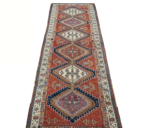 Surface texture of 1930s Sarab rug with natural Wool and intricate pattern