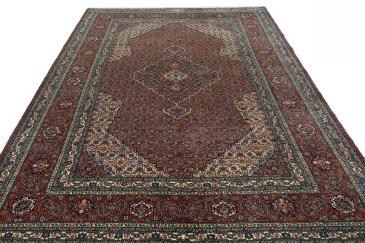 Surface texture of 1970s Sarab rug with natural Wool and intricate pattern