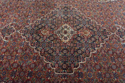 Central medallion detail of 1970s Sarab rug from Iran / Persia