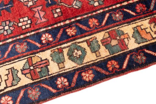 Backside of handmade 2000s Sarab rug showing knot structure and weave density