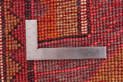 Corner detail of 2000s Sarab rug showing border pattern and Wool pile
