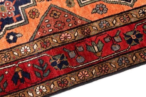 Backside of handmade 1999s Sarab rug showing knot structure and weave density