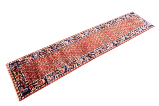 Corner detail of 1989s Sarab rug showing border pattern and Wool pile