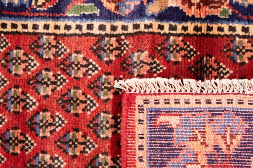Full view of 1989s Sarab rug from Iran / Persia, 280 × 62 cm in Red tones