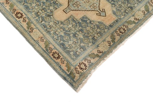 Backside of handmade 1920s Senneh rug showing knot structure and weave density