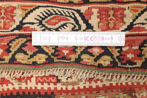 Close-up detail of 1900s Senneh rug from Iran / Persia showing Wool weave