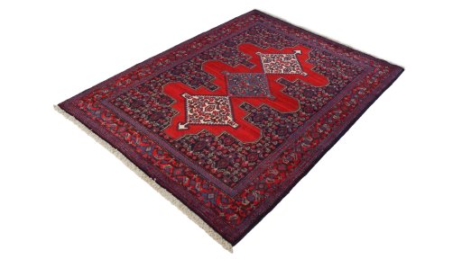 Close-up detail of 1940s Senneh rug from Iran / Persia showing Wool weave
