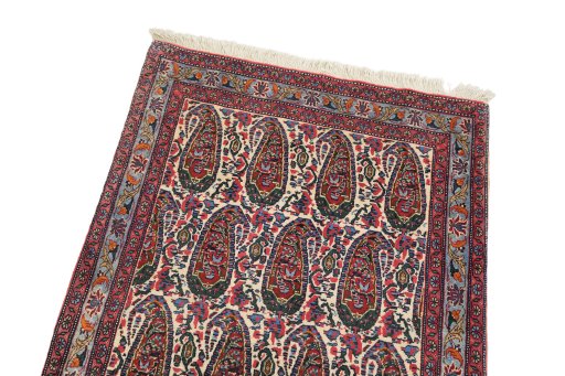 Surface texture of 1980s Senneh rug with natural Wool and intricate pattern