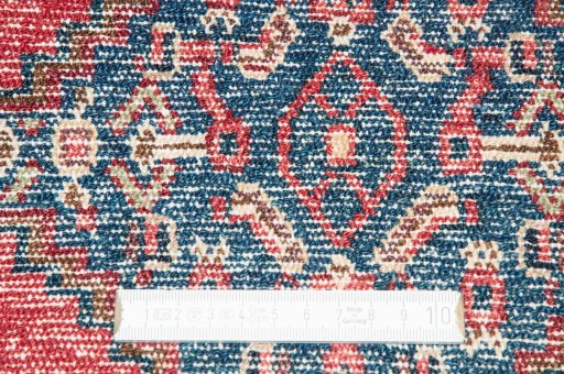Backside of handmade 2000s Senneh rug showing knot structure and weave density