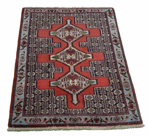 Backside of handmade New Senneh rug showing knot structure and weave density