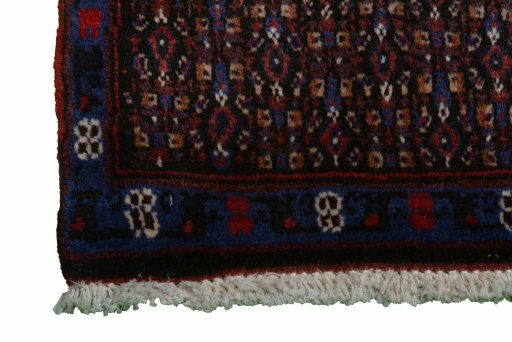 Close-up detail of New Senneh rug from Iran / Persia showing Wool weave