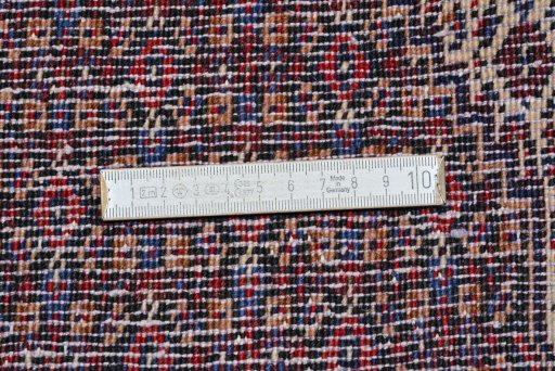 Corner detail of New Senneh rug showing border pattern and Wool pile