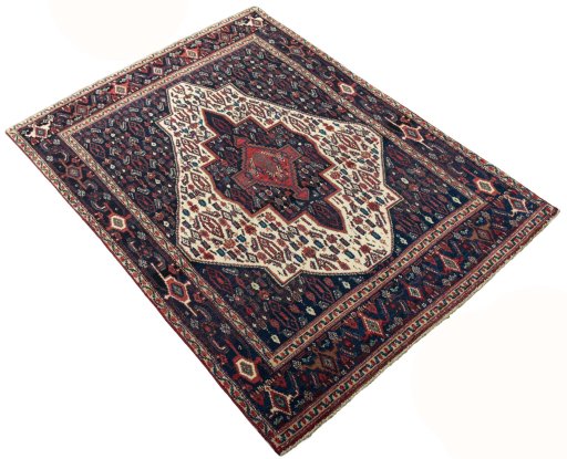Close-up detail of 1970s Senneh rug from Iran / Persia showing Wool weave