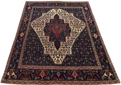 Surface texture of 1970s Senneh rug with natural Wool and intricate pattern