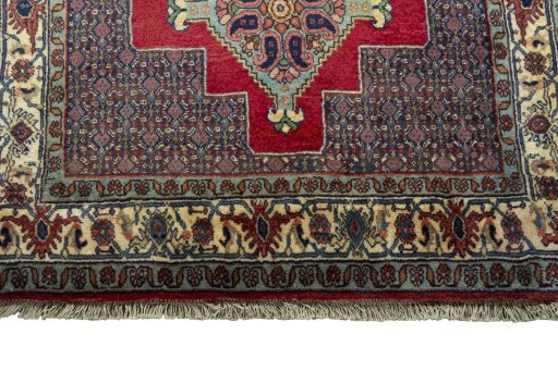 Central medallion detail of New Senneh rug from Iran / Persia