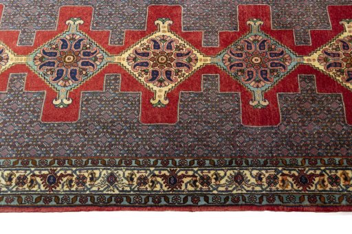 Close-up detail of New Senneh rug from Iran / Persia showing Wool weave