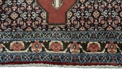 Central medallion detail of 2000s Senneh rug from Iran / Persia