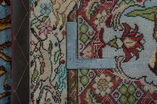 Close-up detail of 2000s Senneh rug from Iran / Persia showing Wool weave