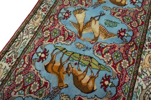 Backside of handmade 2000s Senneh rug showing knot structure and weave density
