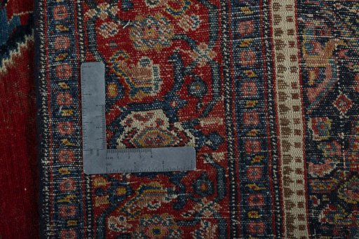Surface texture of 1930s Senneh rug with natural Wool and intricate pattern