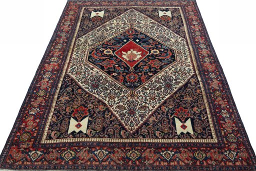 Surface texture of 1930s Senneh rug with natural Wool and intricate pattern