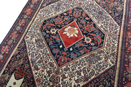 Backside of handmade 1930s Senneh rug showing knot structure and weave density