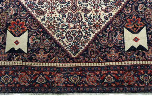 Close-up detail of 1930s Senneh rug from Iran / Persia showing Wool weave