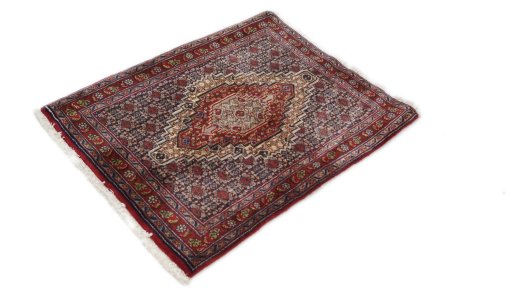 Close-up detail of 1990s Senneh rug from Iran / Persia showing Wool weave