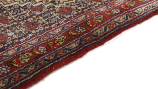 Central medallion detail of 1990s Senneh rug from Iran / Persia