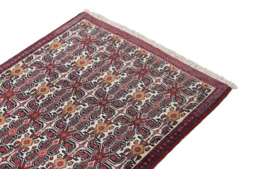 Surface texture of 1990s Senneh rug with natural Wool and intricate pattern