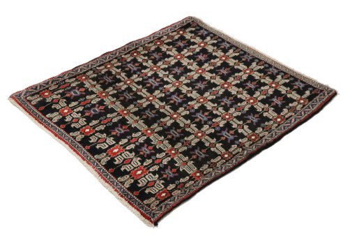 Close-up detail of 1950s Senneh rug from Iran / Persia showing Wool weave