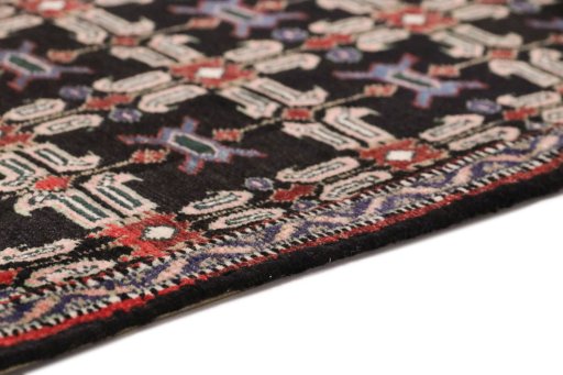 Central medallion detail of 1950s Senneh rug from Iran / Persia