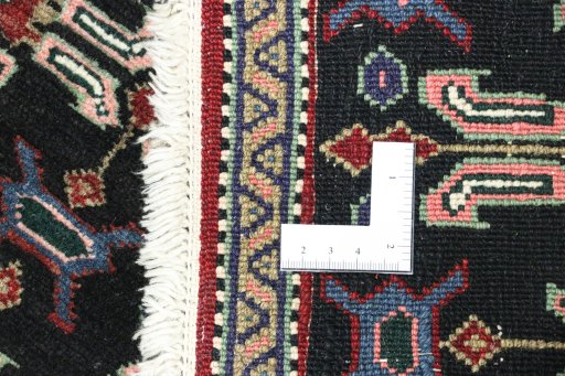 Close-up detail of 1950s Senneh rug from Iran / Persia showing Wool weave