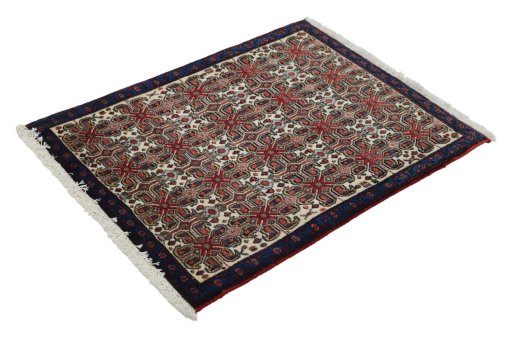 Close-up detail of 1960s Senneh rug from Iran / Persia showing Wool weave