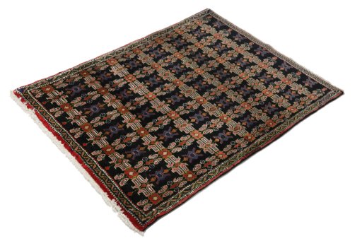 Close-up detail of 1950s Senneh rug from Iran / Persia showing Wool weave