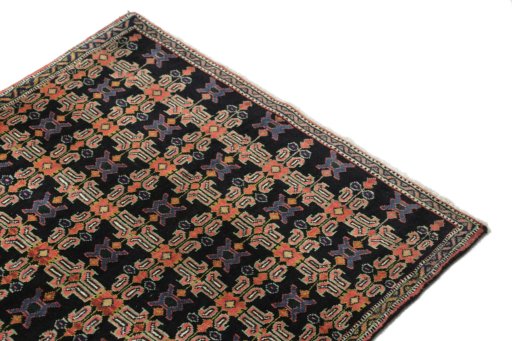 Surface texture of 1950s Senneh rug with natural Wool and intricate pattern