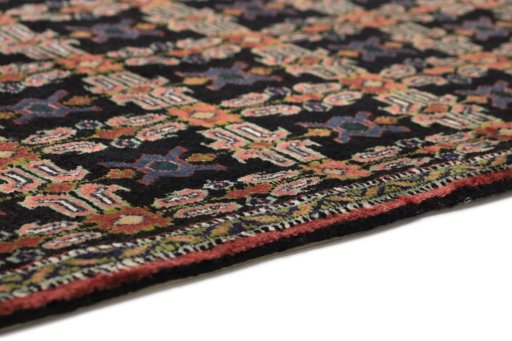 Central medallion detail of 1950s Senneh rug from Iran / Persia